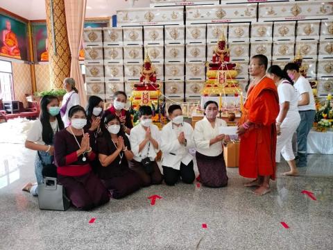 ร่วมพิธีตัดผ้าขาวบริจาคโลงศพ